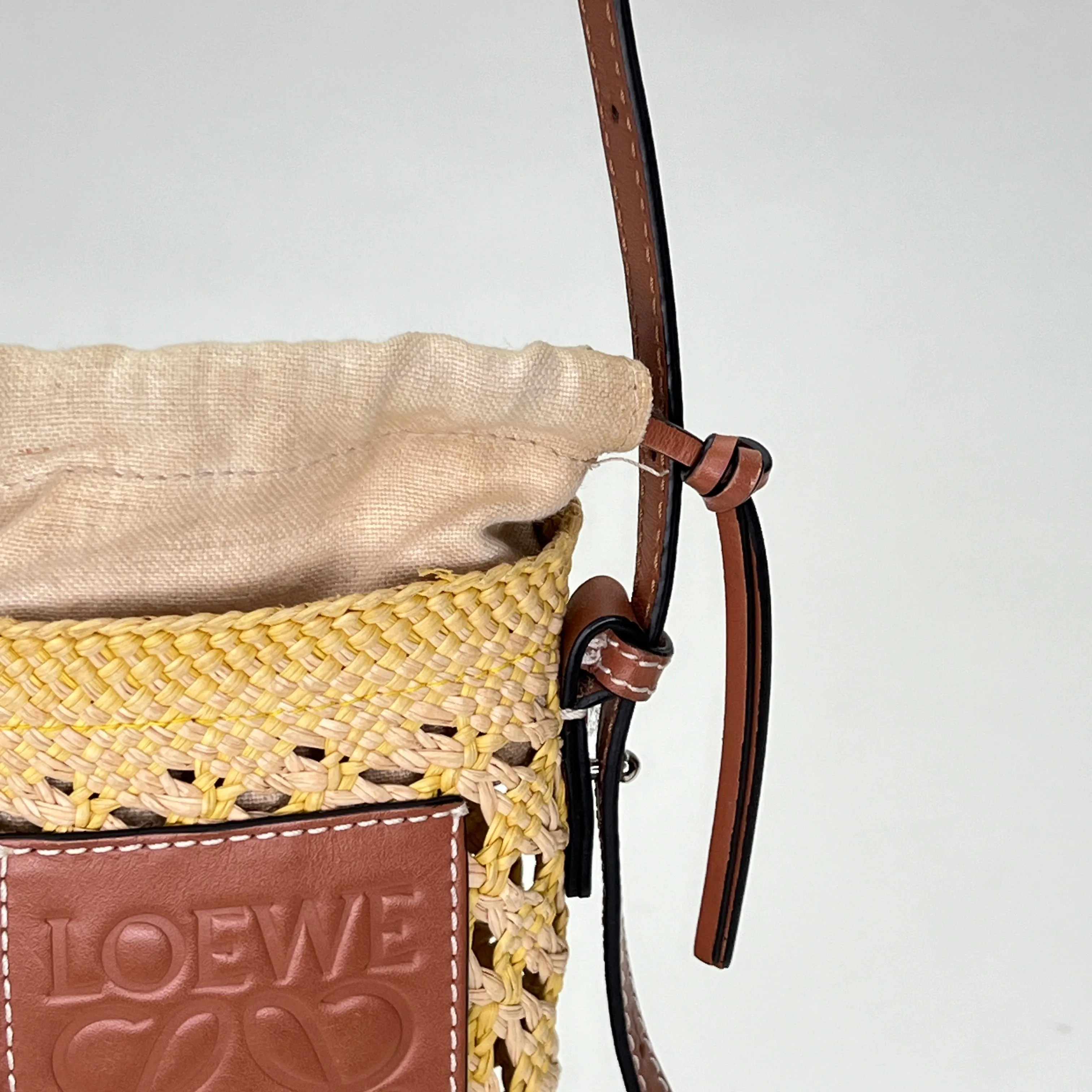 Cylinder Pouch Brown Crossbody Bag in Raffia