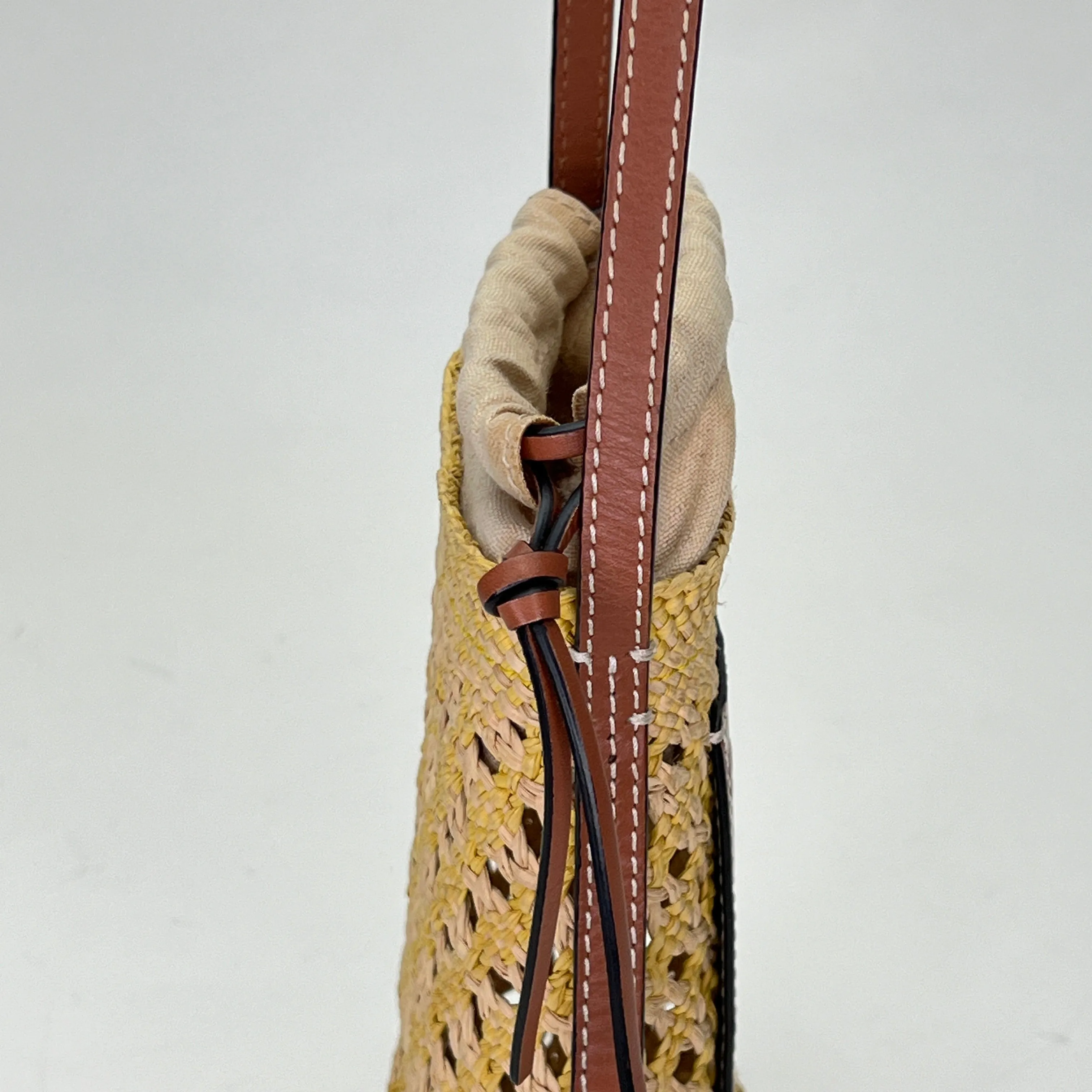 Cylinder Pouch Brown Crossbody Bag in Raffia