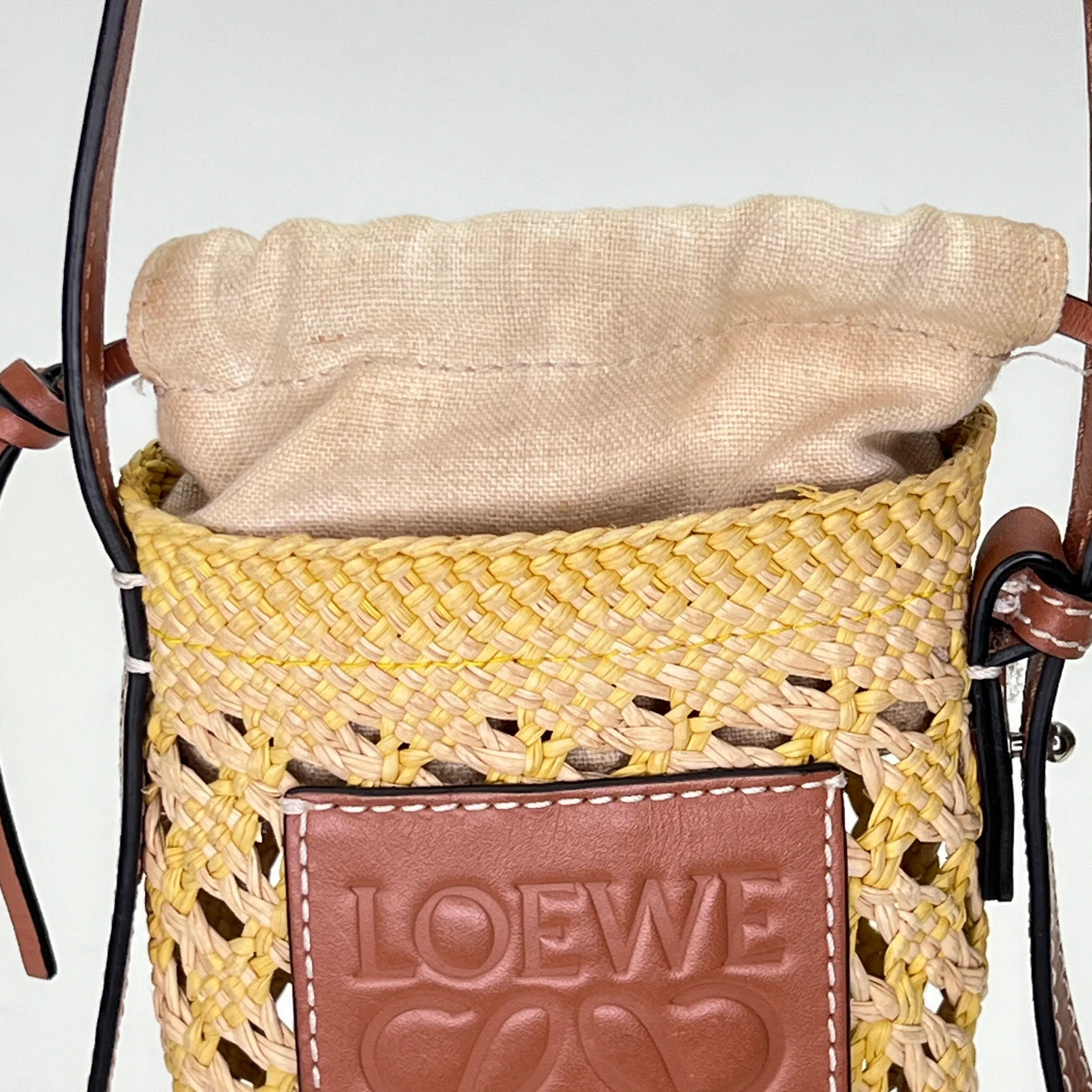 Cylinder Pouch Brown Crossbody Bag in Raffia