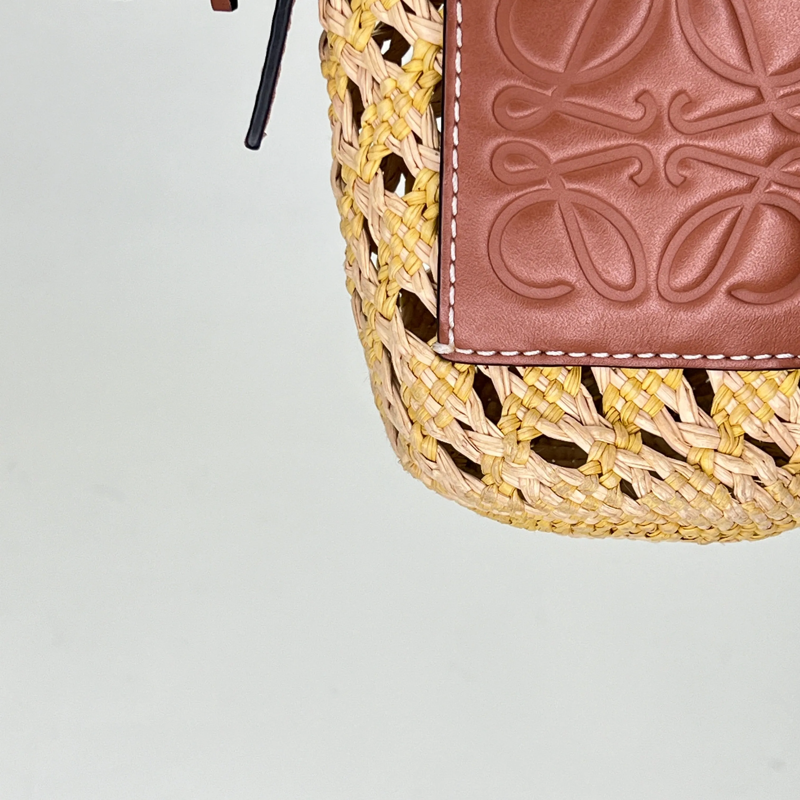 Cylinder Pouch Brown Crossbody Bag in Raffia